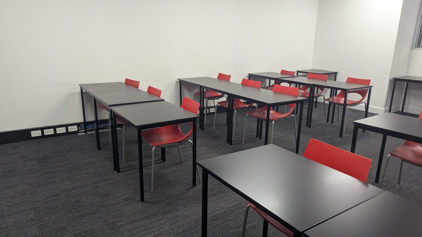 Rows of desks in the Vertex Mathematics teaching room